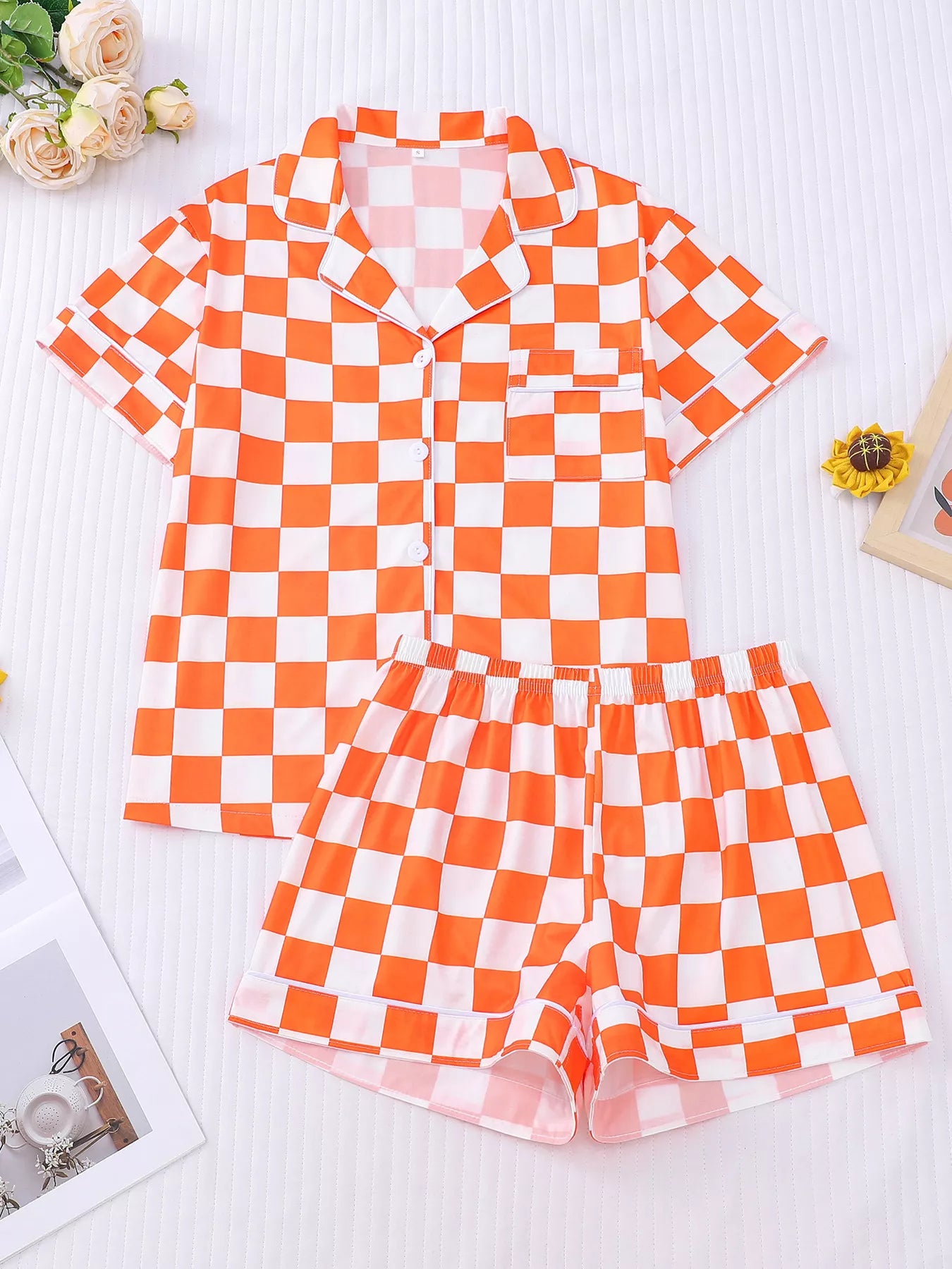 Checkered print lounge set flat lay showing top and matching shorts