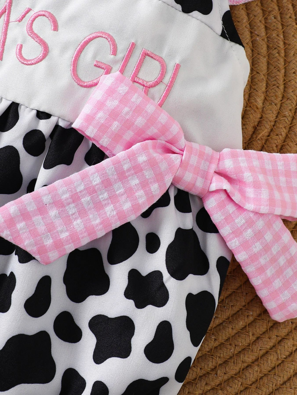 “Baby girl cow print ruffle one‑piece, multiple size options