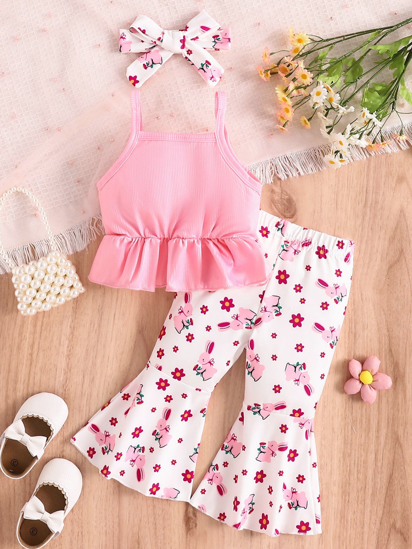 “Pink baby girl outfit with ruffle tank and flare pants