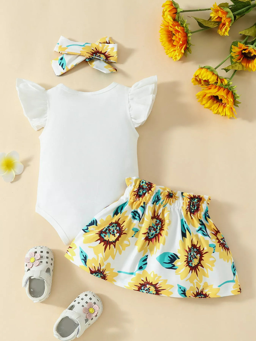 “Baby girl sunflower skirt set with matching headband”